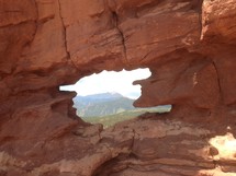 hole through red rock