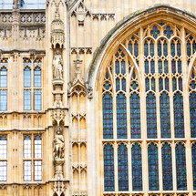 windows and ornate detail on the exterior of a cathedral in London 