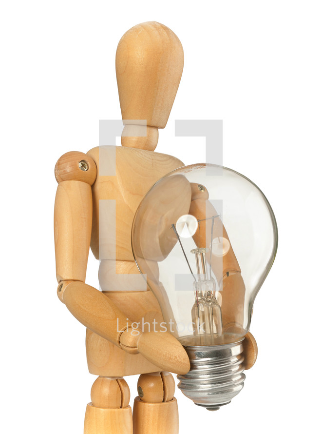 Wooden dummy that maintains a light bulb in hand on white background