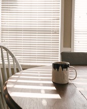 coffee cup on a kitchen table 