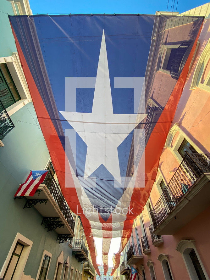 Cuban flag over the streets of Cuba 