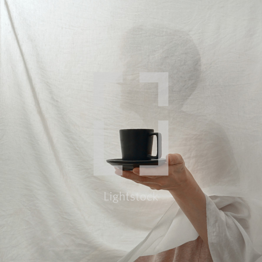 Abstract Woman Hiding Behind White Curtains Holding A Cup of Coffee