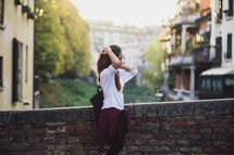 teen girl standing outdoors 