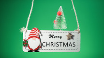 Merry Christmas signboard on green screen