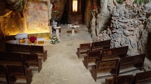 ancient Catholic church located in a natural cave