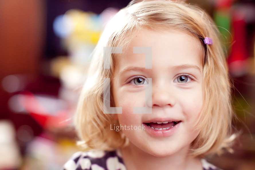 face of smiling toddler girl 