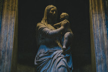 stone statue of Mary and baby Jesus