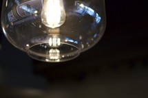 lightbulb in a glass lantern 
