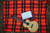 guitar, Bible, journal, blanket, plaid blanket 