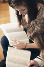 Friends reading the Bible together.