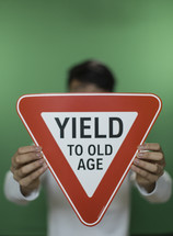 Yield to old age sign 