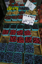 pints of fruit in a market 