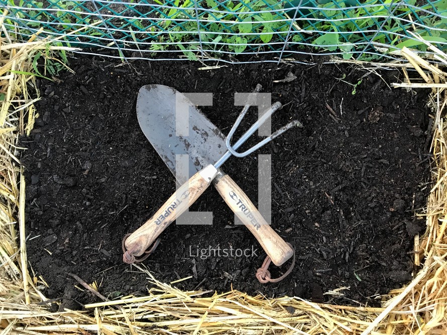 gardening tools on soil 
