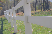 white fence on a rural landscape 