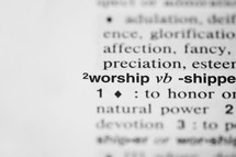 word worship on the pages of a dictionary 