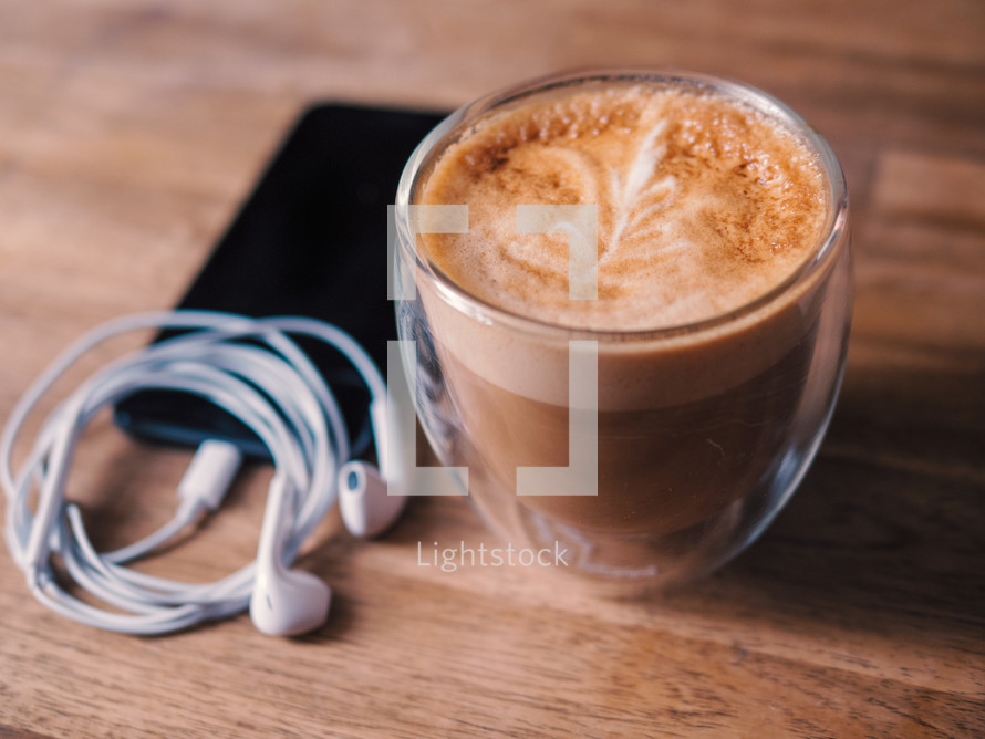 coffee with earbuds 