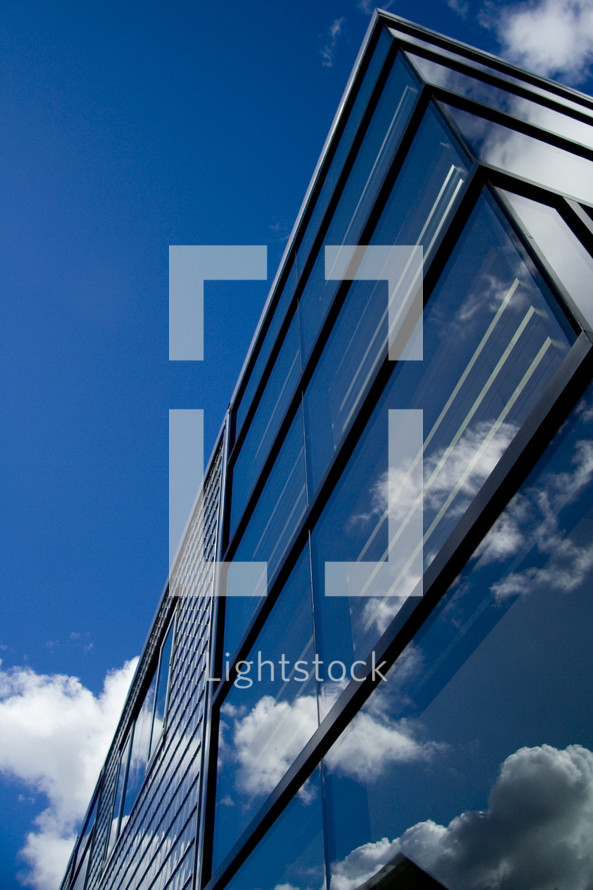 Sky reflection on office building