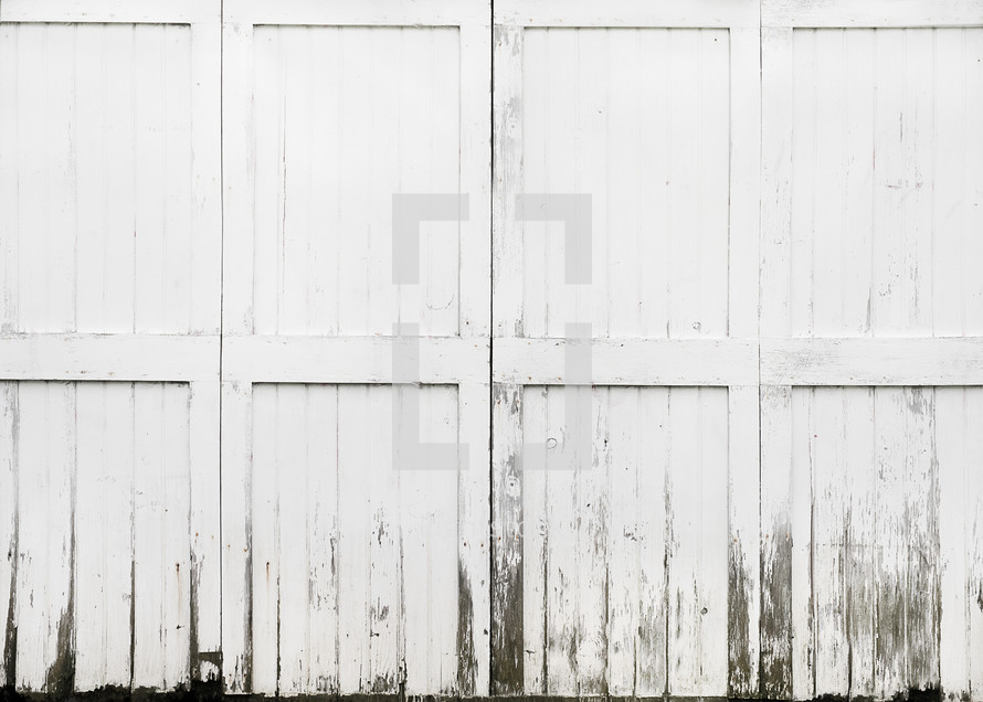 weathered white barn doors background 
