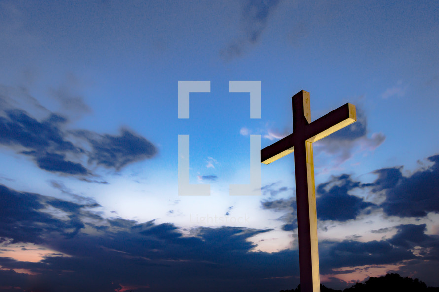 silhouette of a cross outdoors 
