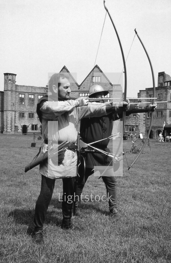 Medieval archery longbow men