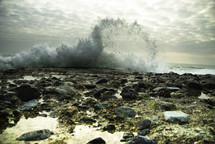 waves crashing onto a rocky beach