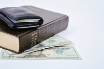 wallet, Bible, and cash