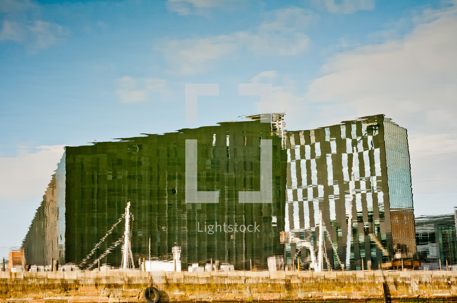 reflection of buildings on water in Liverpool