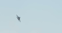Israeli Air force F-15 fighter jet maneuvering at low altitude during an airshow