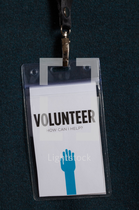 A plastic badge for a volunteer.