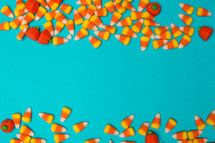 candy corn border on a blue background 