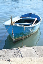 boat tied to the shore 