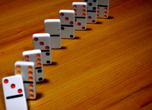 dominoes on a wood floor 