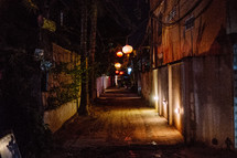 Hanging lanterns over the streets of Cambodia at night. 