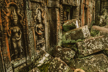 engravings in stone on temple ruins in Cambodia 