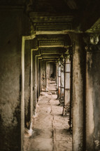 hallway of ruins in Cambodia 