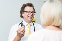 a doctor talking with a patient 