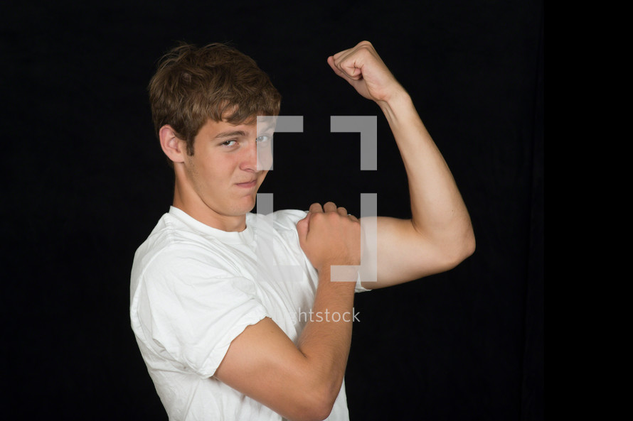 Man flexing his muscles.