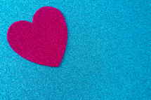 pink heart on blue 