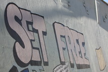 Set Free written on wall in graffiti