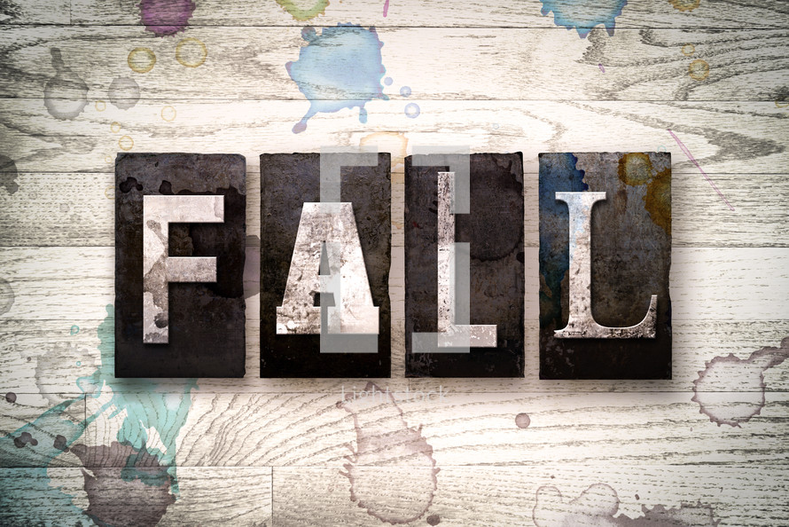word fall on wood background 