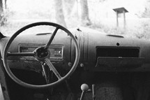 steering wheel in an old junk car 