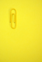 paper clip on yellow 