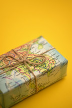 Map Paper Travel Concept with Gift Box With String Bow