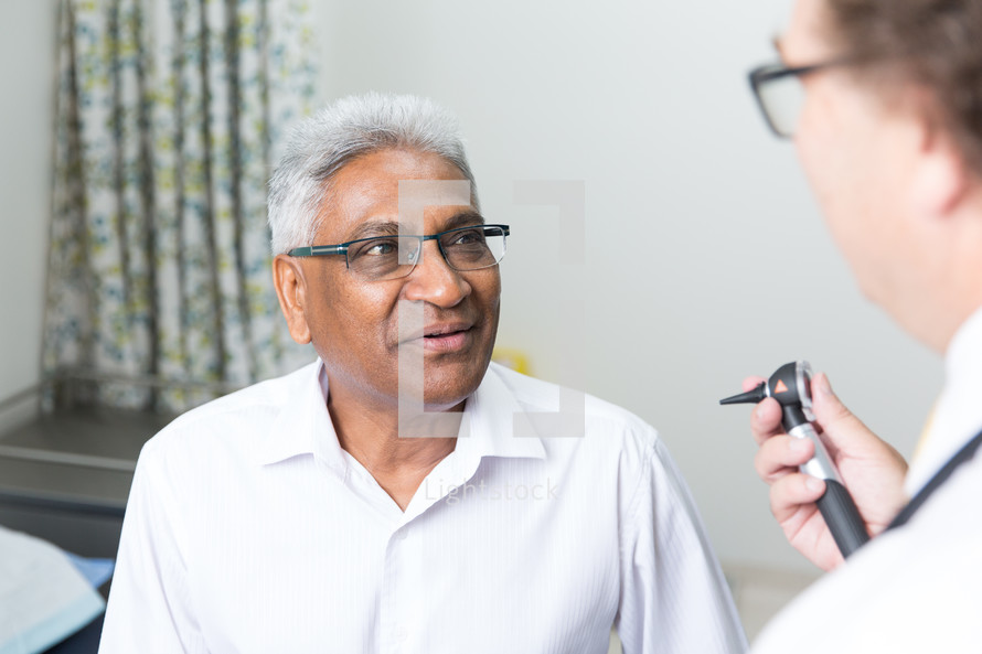 a patient talking with his doctor 
