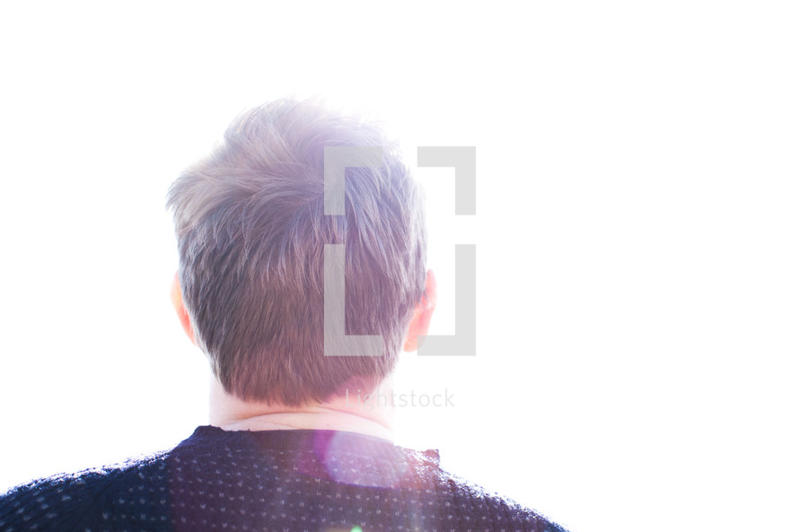 back of a man's head as he looks to God 