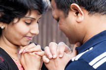 An Indian couple praying together 