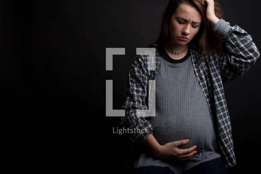 An anxious pregnant teenager.