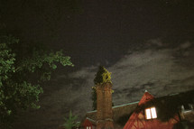 clouds over an inn at night