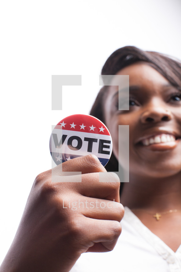 young woman and a vote button 