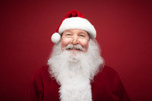 headshot of a smiling Santa 